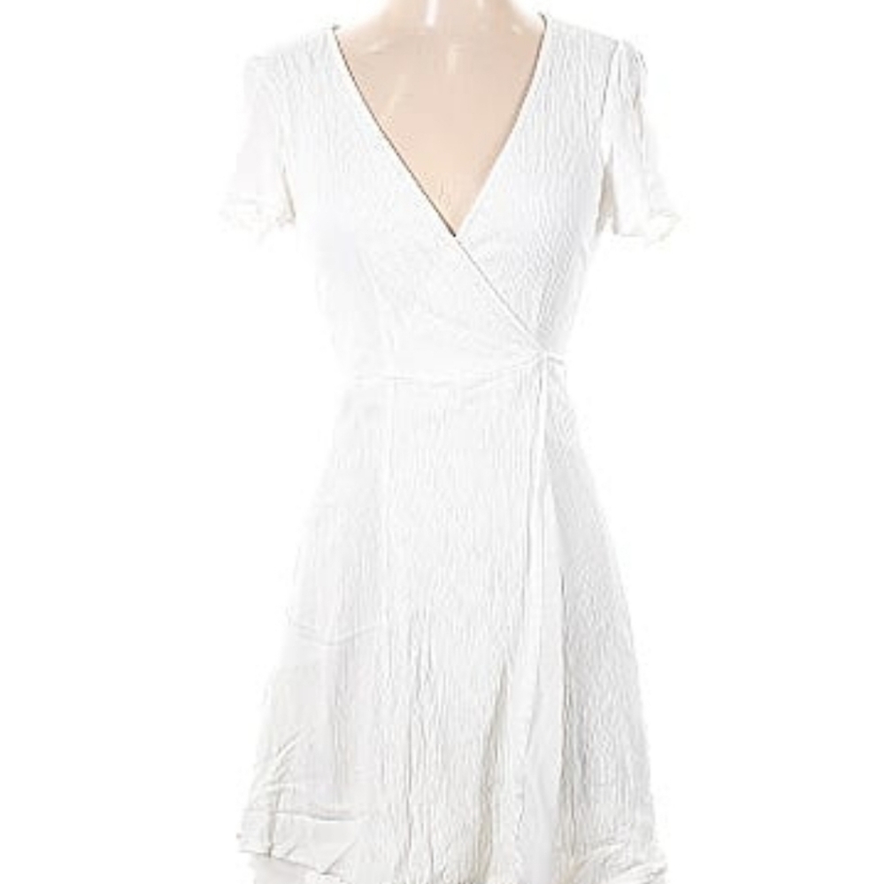 Lulu's white wrap dress with flutter sleeves.